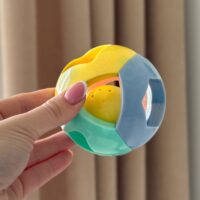 WOOPIE BABY pastelinis barškutis ropojantis kamuoliukas 0m+