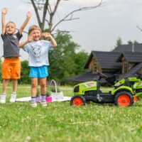FALK pedalinis traktorius su krautuvu ir Claas priekaba