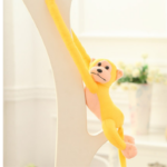 Pliušinė beždžionė su garsu geltona 80 cm