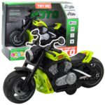 Žalias žaislinis motociklas su šviesomis