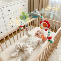 Woopie Baby interaktyvus žaislų lankelis su melodijomis ir švieselėmis