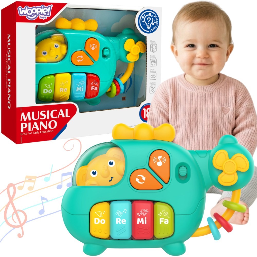 Woopie interaktyvus pianinas–sraigtasparnis su drambliuku Woopie interaktyvus pianinas–sraigtasparnis su drambliuku